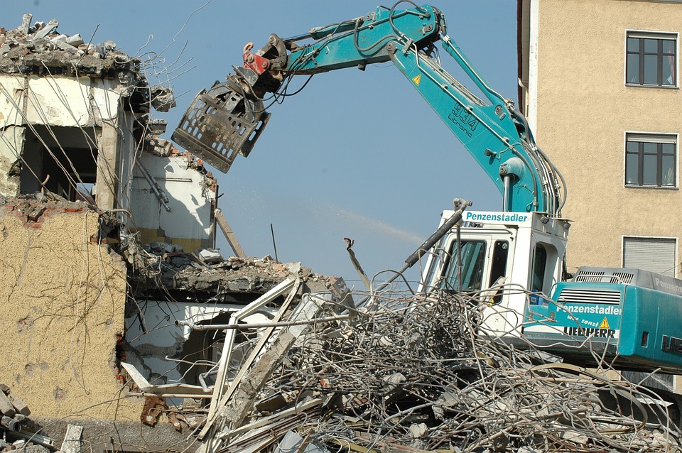 crane demolishing a building