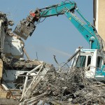 crane demolishing a building